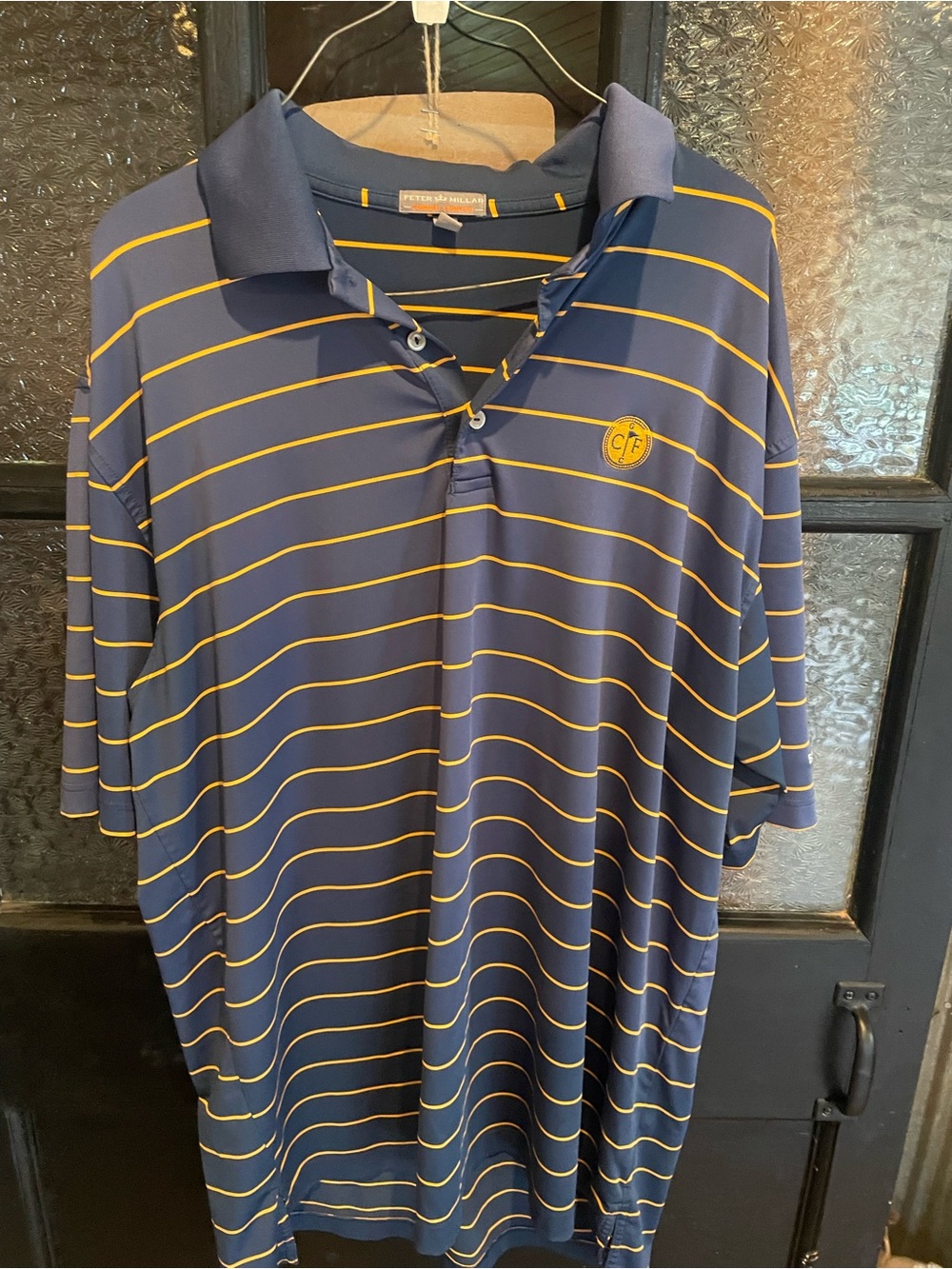 Peter Millar Navy with Yellow Stripe Performance Polo